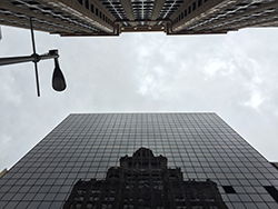 Reflection of the Niels Esperson Building